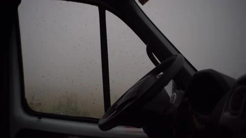 Raindrops falling down the foggy car window Stock-Footage 210308549