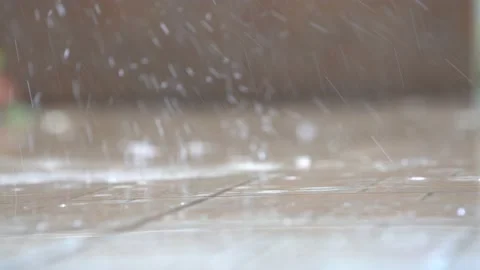 Raindrops falling on the floor Stock Footage 151906262