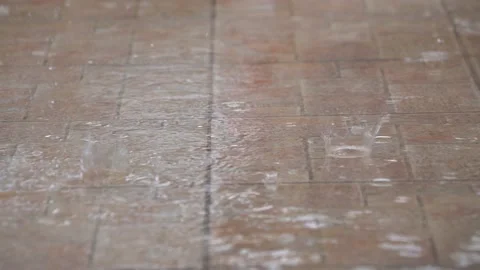 Raindrops falling on the floor Stock Footage 151906507