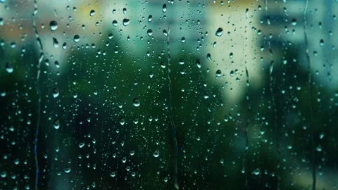 Raindrops falling on the glass 4K Stock Footage 157657184
