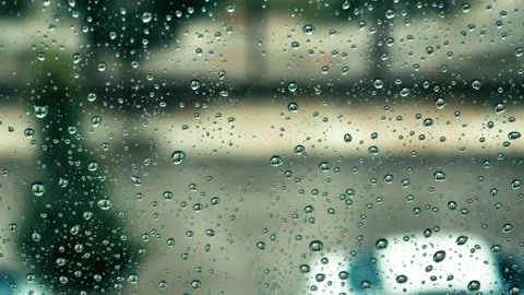 Raindrops falling on the glass 4K Stock Footage 157657493