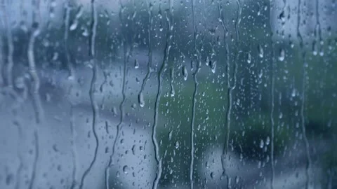 Raindrops falling on the glass 4K Stock Footage 157658081