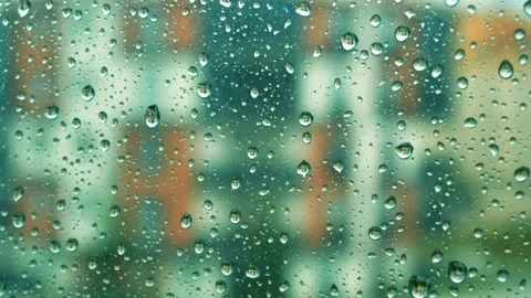 Raindrops falling on the glass 4K Stock Footage 157658230