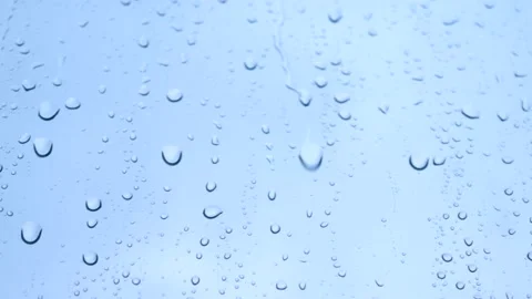 Raindrops falling on the glass 4K Stock Footage 157658490