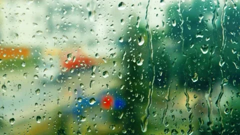 Raindrops falling on the glass 4K Stock Footage 157658603