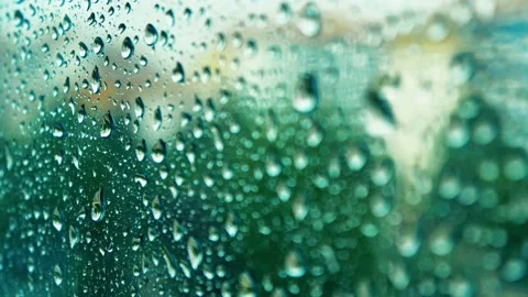 Raindrops falling on the glass 4K Stock Footage 157658699