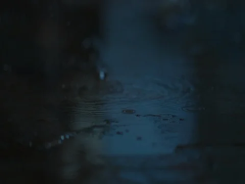 Raindrops falling into the ground from the ceiling. Old fabric building. Stock Footage 70717856