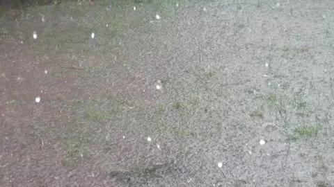 Raindrops falling on the ground surface Stock Footage 324531733