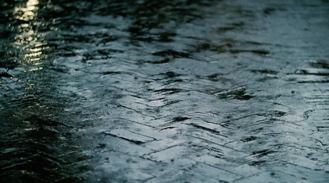 Raindrops falling on Paved Street Video stock 58381318