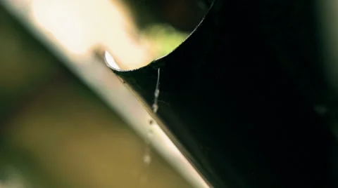 Raindrops falling from pipe, slow motion shot Stock-Footage 40581244