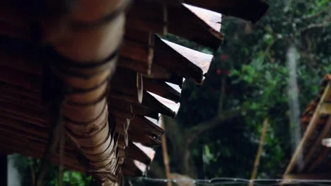 Raindrops falling from the roof of the house Stock Footage 302593728