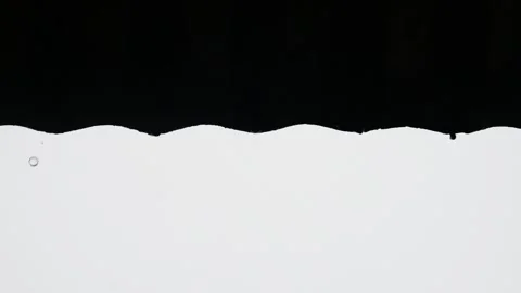 Raindrops falling from the roof of the house Stock Footage 302593876