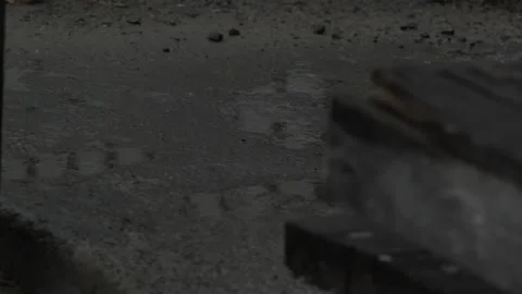 Raindrops falling on the rural floor Stock Footage 233382075