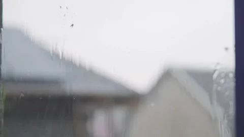 Raindrops falling in slow motion. Rain in slow motion. Raindrops close-up Stock Footage 261221139