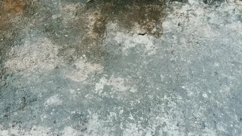 Raindrops Falling on Wet RCC Road Surface During Rainy Season 動画素材 315267065