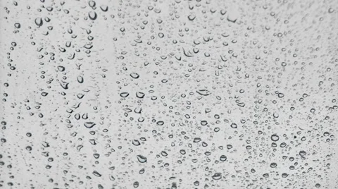 Raindrops falling on window Stock Footage 57021763