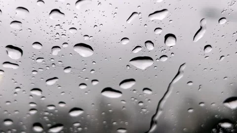 Raindrops falling on the window Stock Footage 172230810
