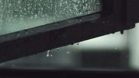 Raindrops Falling on Window Panel Slow Motion Video stock 149871719