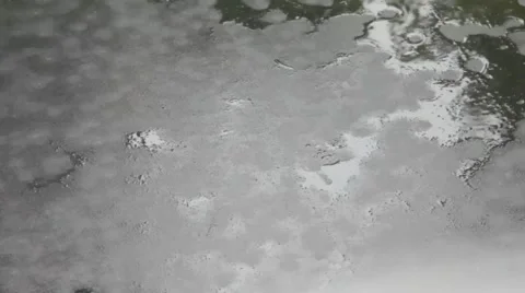 Raindrops on a flat black surface of the trampoline or asphalt Stock-Footage 41604946