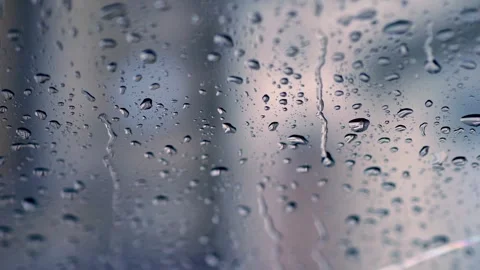 Raindrops flow down the glass, dreary autumn Stock Footage 244657662