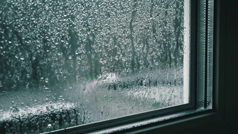 Raindrops Flow Down the Window Glass in Cloudy Weather Stock Footage 260935047