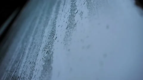  raindrops flowing down the window glass Stock Footage 225111815