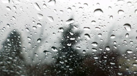 Raindrops on front glass of the car Stock Footage 60360833