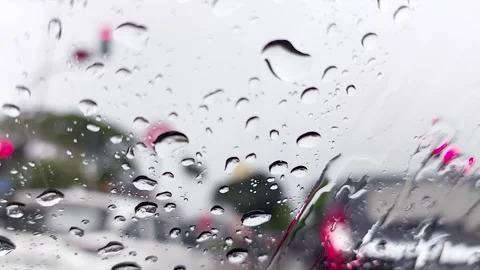 Raindrops on front glass of the window car Stock Footage 274205161