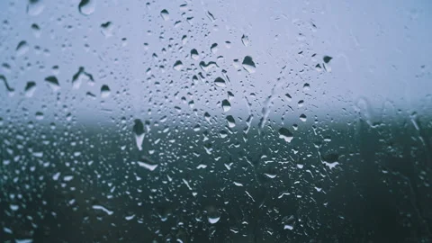 Raindrops on Glass, Blurred Background Stock Footage 295043184
