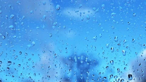Raindrops on glass close-up on the background of the sky Stock Footage 171152616