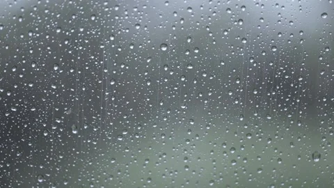 Raindrops on glass close up Video stock 238002618