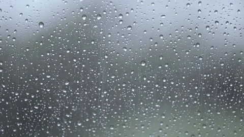 Raindrops on glass close up Vídeo Stock 239033203