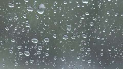 Raindrops on glass close up Video stock 240481394