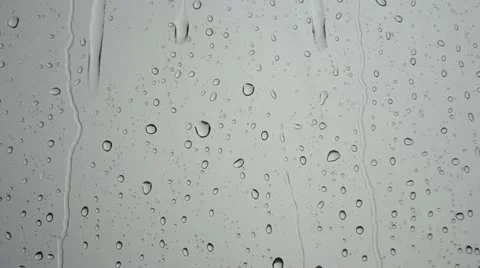 Raindrops on glass Stock Footage 22178650