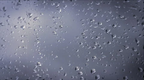 Raindrops on glass Stock Footage 54833566