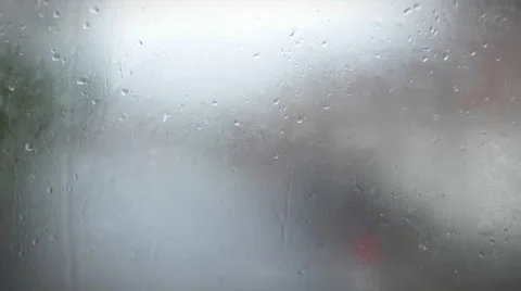 Raindrops on glass Stock Footage 54833929