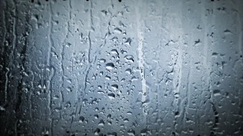 Raindrops on glass Stock Footage 54834228