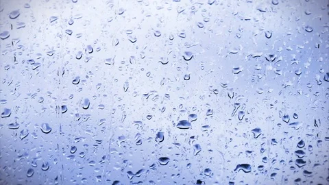 Raindrops on glass Stock Footage 74517430