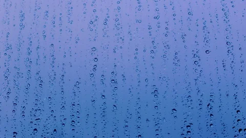 Raindrops on glass Stock Footage 82384164