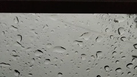 Raindrops on Glass Stock Footage 236953272