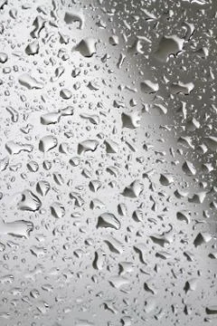 Raindrops on a glass Stock Photos