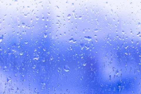 Raindrops on a glass Stock Photos