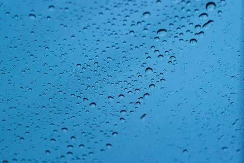 Raindrops on glass Stock Photos
