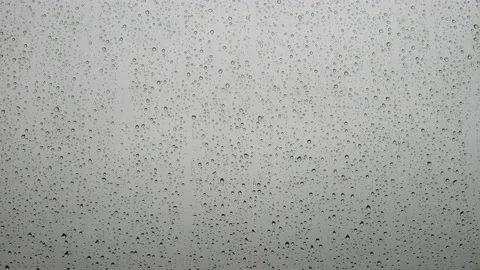Raindrops on glass surface. Stock Footage 131665595