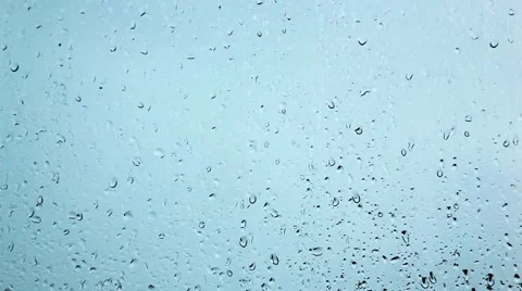 Raindrops on a glass surface. looped Stockbeeldmateriaal 45866655