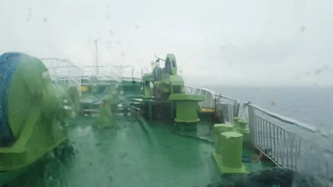 Raindrops on glass while sailing the stormy sea Stock Footage 306282605