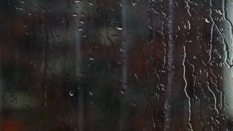Raindrops on the glass window during heavy rain Stock Footage 319886533