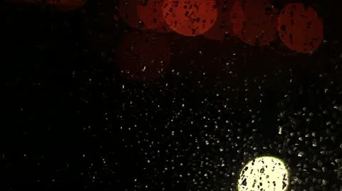Raindrops on glass window Stock Footage 12424402