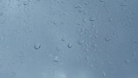 Raindrops on glass window Stock Footage 78109925