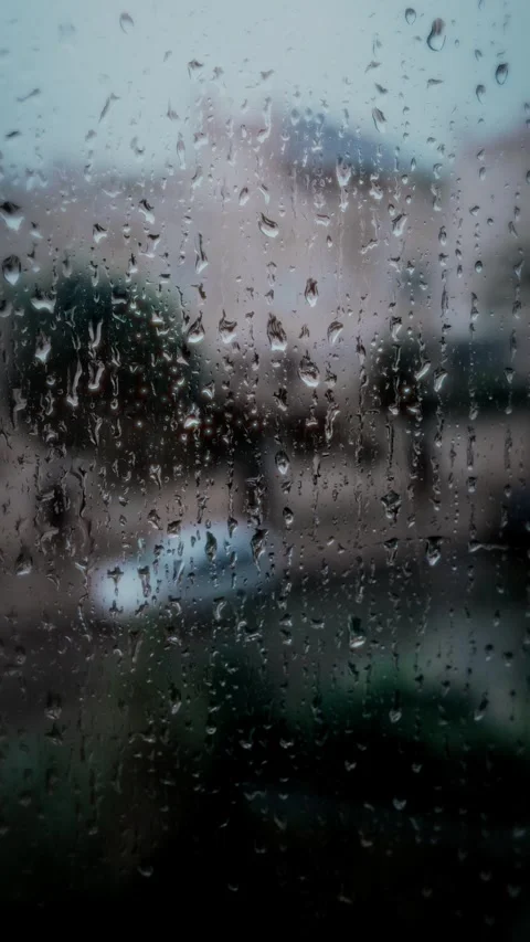 Raindrops on Glass Window Stock Footage 285647859